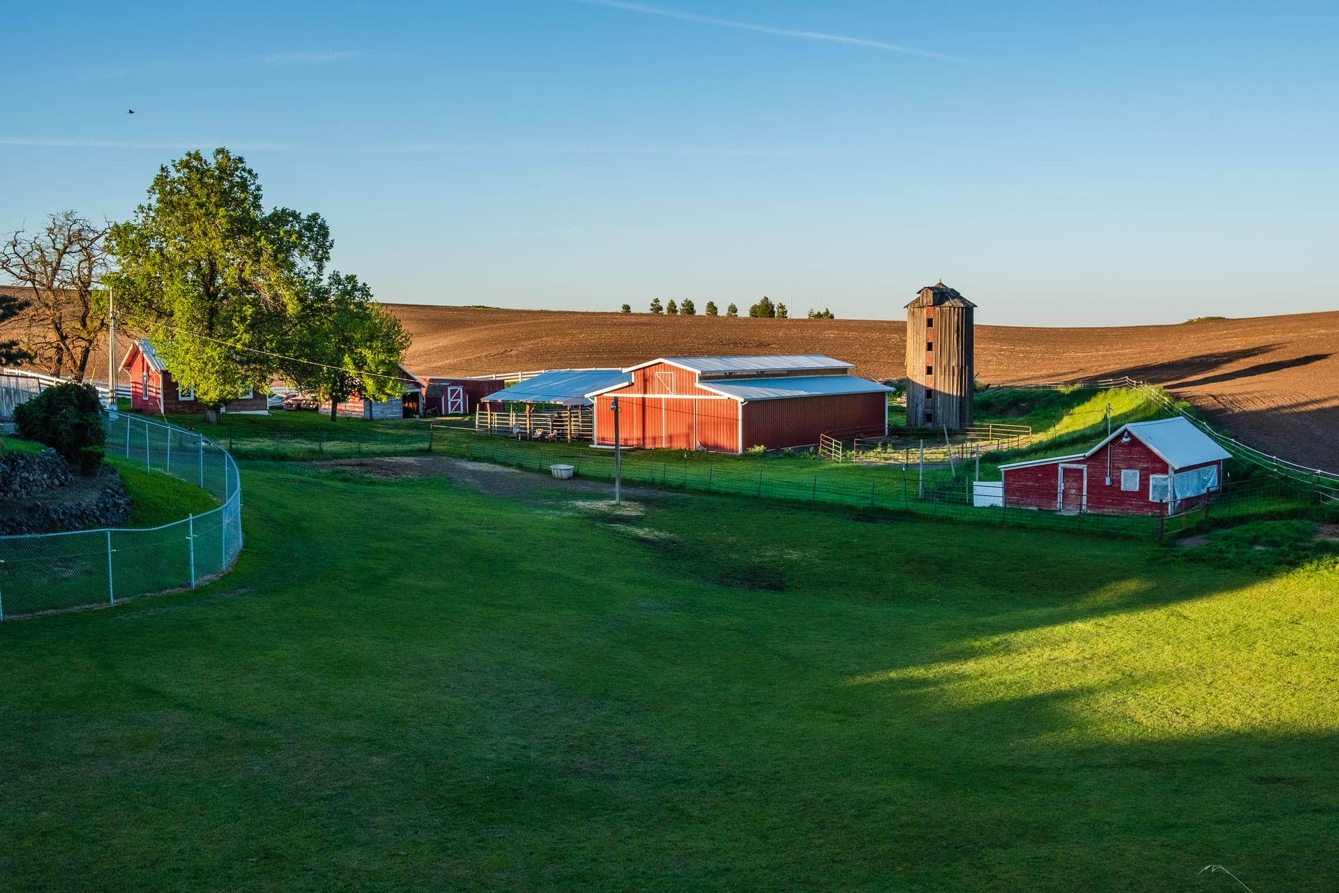 farm house near agricultural field