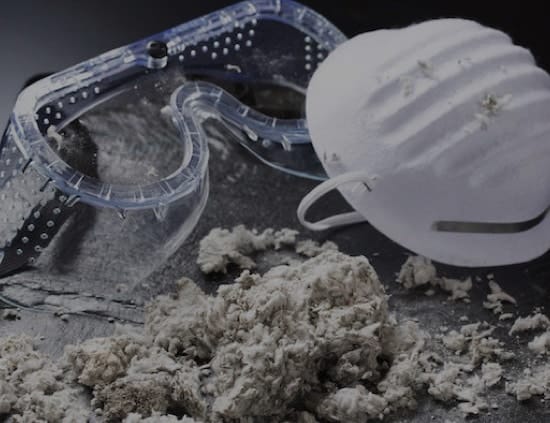 asbestos dust with safety goggles and mask
